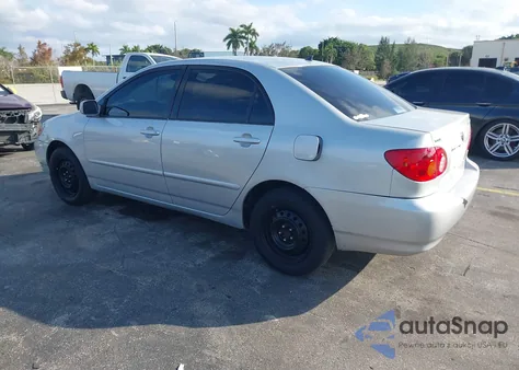 2004 Toyota Corolla Le z USA, uszkodzony, nr VIN JTDBR32EX42024809